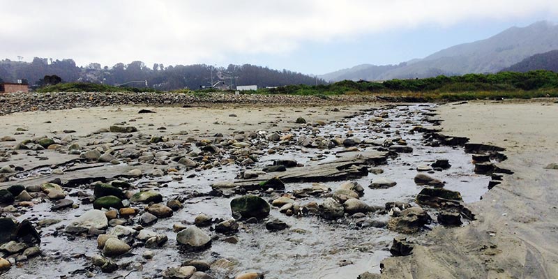 A creek that runs into Pacifica state beach in California.